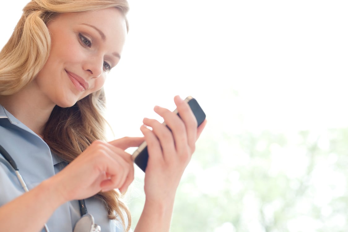 Nurse using a smart phone